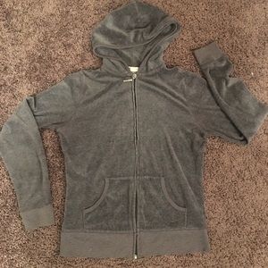 Velour zip up jacket. Design on back.